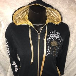 Black and gold skull 💀 hoodie has some wear